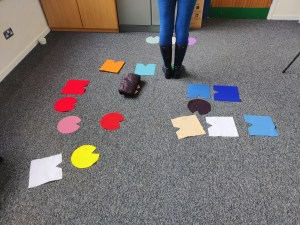 One-to-one, in-person Family Constellation with floor markers.